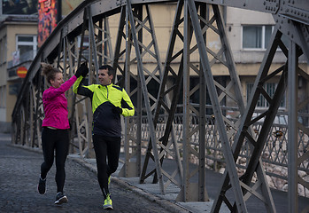 Image showing young  couple jogging