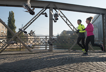 Image showing young  couple jogging