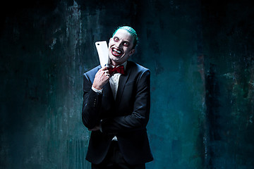 Image showing Bloody Halloween theme: crazy joker face