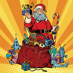 Image showing Santa Claus with bag of gifts. Christmas and New year