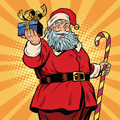 Image showing Santa Claus with a gift, Christmas and new year