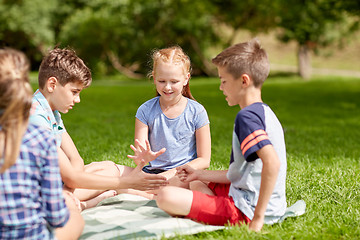 Image showing happy kids playing rock-paper-scissors game