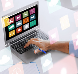 Image showing businessman with laptop computer working at office