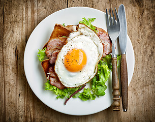 Image showing fried egg on white plate