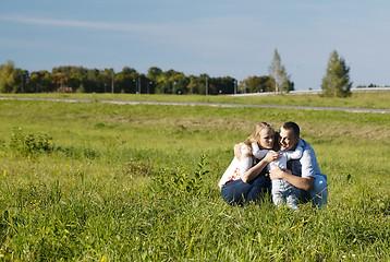 Image showing Family of three having fun outdoors