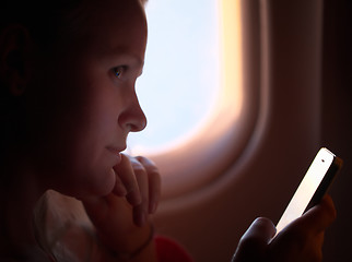 Image showing Taking pictures in the plane