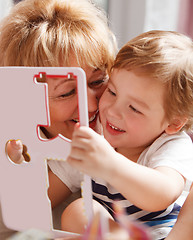 Image showing Grandmother enjoying the time with her grandson