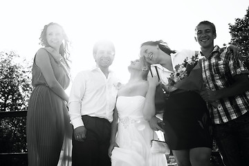 Image showing Bride and groom with their friends