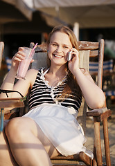 Image showing Woman talking on her mobile