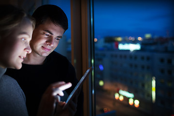 Image showing Friends with Tablet PC by Window