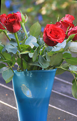 Image showing a vase with  red roses