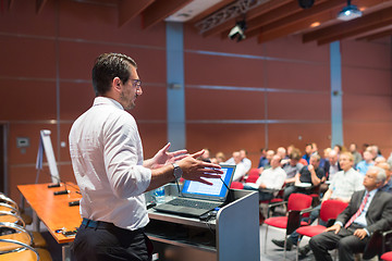 Image showing Public speaker giving talk at Business Event.