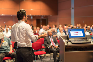 Image showing Public speaker giving talk at Business Event.