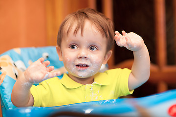 Image showing Happy little boy with face got dirty