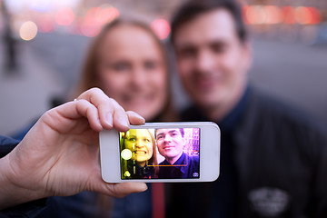 Image showing Happy couple taking self portrait