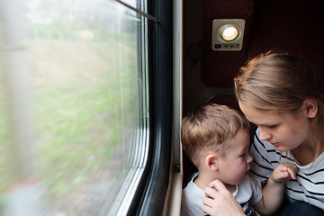 Image showing Mother and son on a train trip