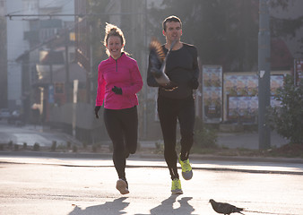 Image showing young  couple jogging