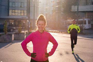 Image showing woman  stretching before morning jogging