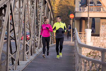 Image showing young  couple jogging