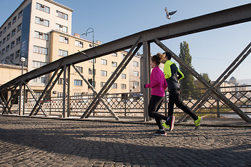 Image showing young  couple jogging