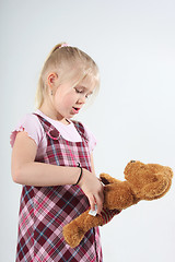 Image showing Girl and her teddy bear