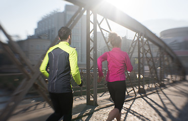 Image showing young  couple jogging