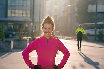 Image showing woman  stretching before morning jogging