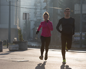 Image showing young  couple jogging