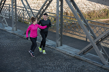 Image showing young  couple jogging