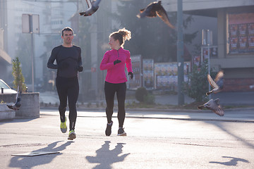 Image showing young  couple jogging