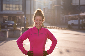 Image showing woman  stretching before morning jogging