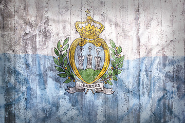 Image showing Grunge style of San Marino flag on a brick wall