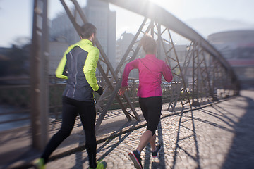 Image showing young  couple jogging