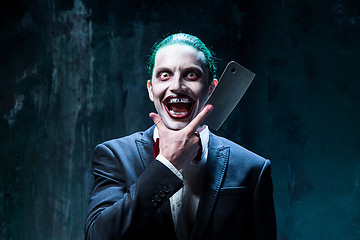 Image showing Bloody Halloween theme: crazy joker face