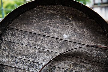 Image showing close up of old wooden barrel outdoors