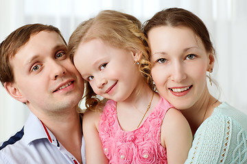 Image showing Happy young parents and little daughter