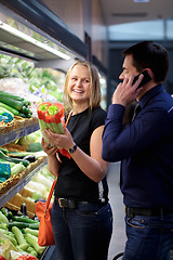 Image showing Woman holding vegetables smiling