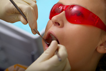 Image showing Young girl at the dentists