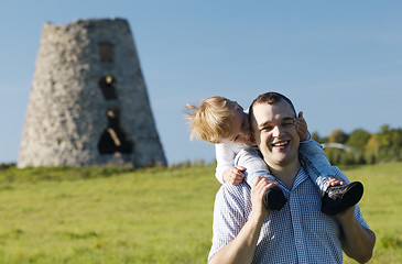 Image showing Happy young father and son playing together