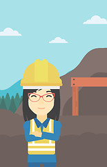 Image showing Miner with mining equipment on background.