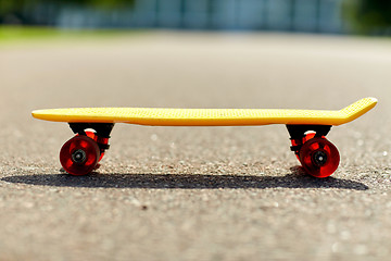 Image showing close up of short modern cruiser skateboard