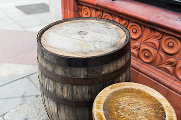 Image showing close up of old wooden barrel table outdoors