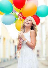 Image showing woman with colorful balloons