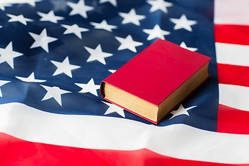 Image showing close up of american flag and book