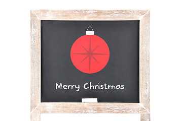 Image showing Christmas greetings with ball on blackboard