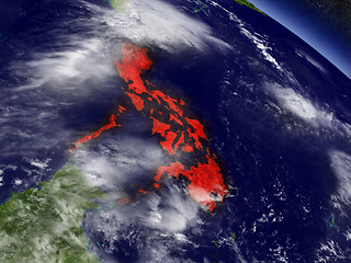 Image showing Philippines from space highlighted in red