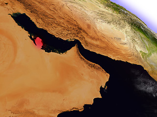 Image showing Qatar from space highlighted in red