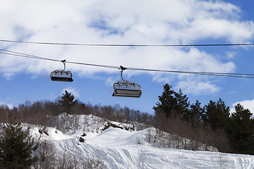 Image showing Chair-lift and off-piste slope in ski resort