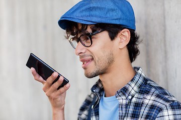 Image showing man using voice command or calling on smartphone