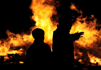 Image showing flaming silhouettes